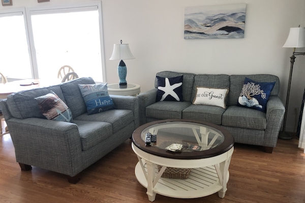 Living area with new 50 inch SMART TV.
