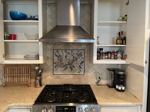 Microwave, coffee/tea maker, cookware/dishes/utensils