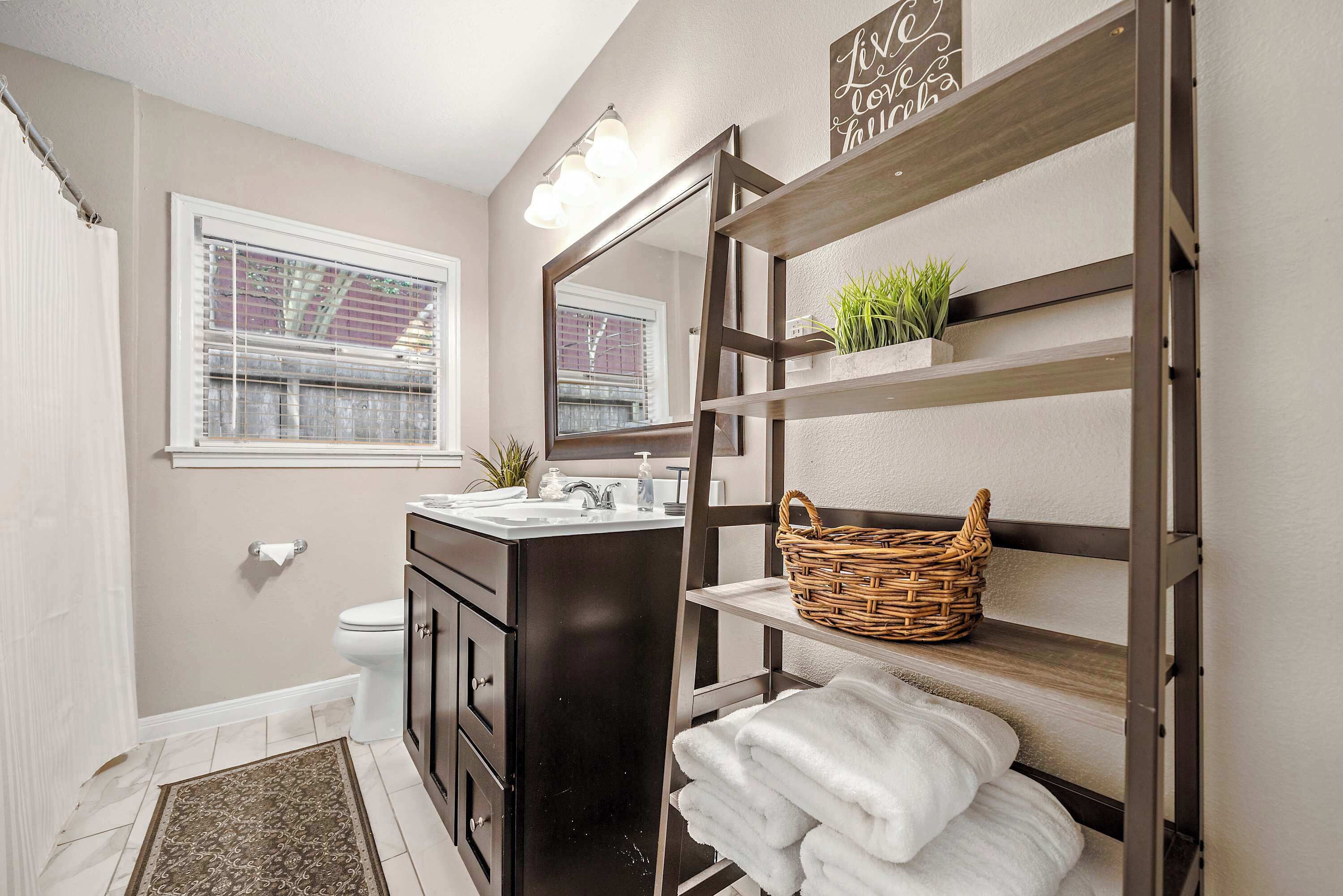 Bathtub, hair dryer, towels