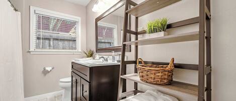 Bathtub, hair dryer, towels