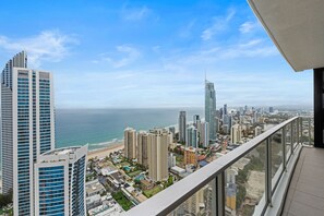 Enjoy breathtaking views of the coastal city from the comfort of your balcony.