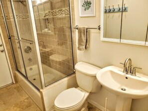 Combined shower/tub, hair dryer, towels, soap