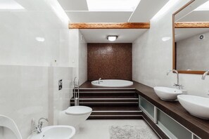 Combined shower/tub, jetted tub