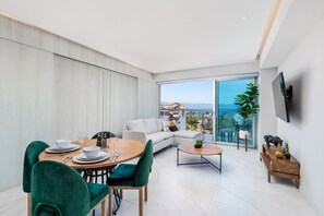 Enjoy meals with family and friends at the dining table, which seats four, while taking in the view from the large window.