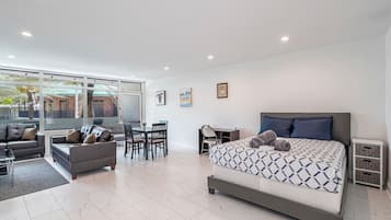 1 bedroom, desk, iron/ironing board, travel crib