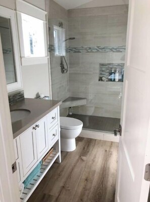 Combined shower/tub, hair dryer, towels, toilet paper
