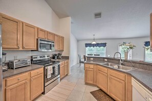 Microwave, stovetop, dishwasher, coffee/tea maker - Ranch-Style Lehigh Acres House with Big Backyard! (Lehigh Acres)