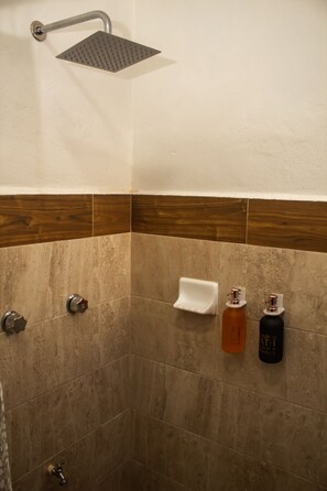 Shower, towels, soap, toilet paper