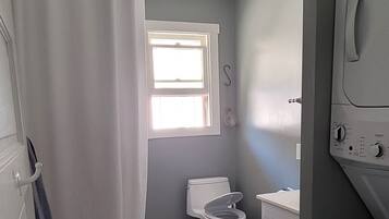 Hair dryer, towels, soap, toilet paper