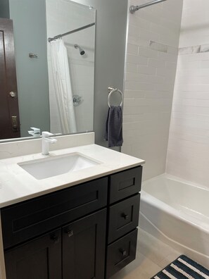 Hair dryer, towels, soap, toilet paper