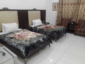 ห้องดีลักซ์ดับเบิลหรือทวิน | Wi-Fi ฟรี, ผ้าปูที่นอน