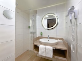 Shower, eco-friendly toiletries, towels, soap