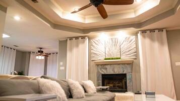 Smart TV, fireplace, books