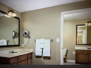 Combined shower/tub, jetted tub