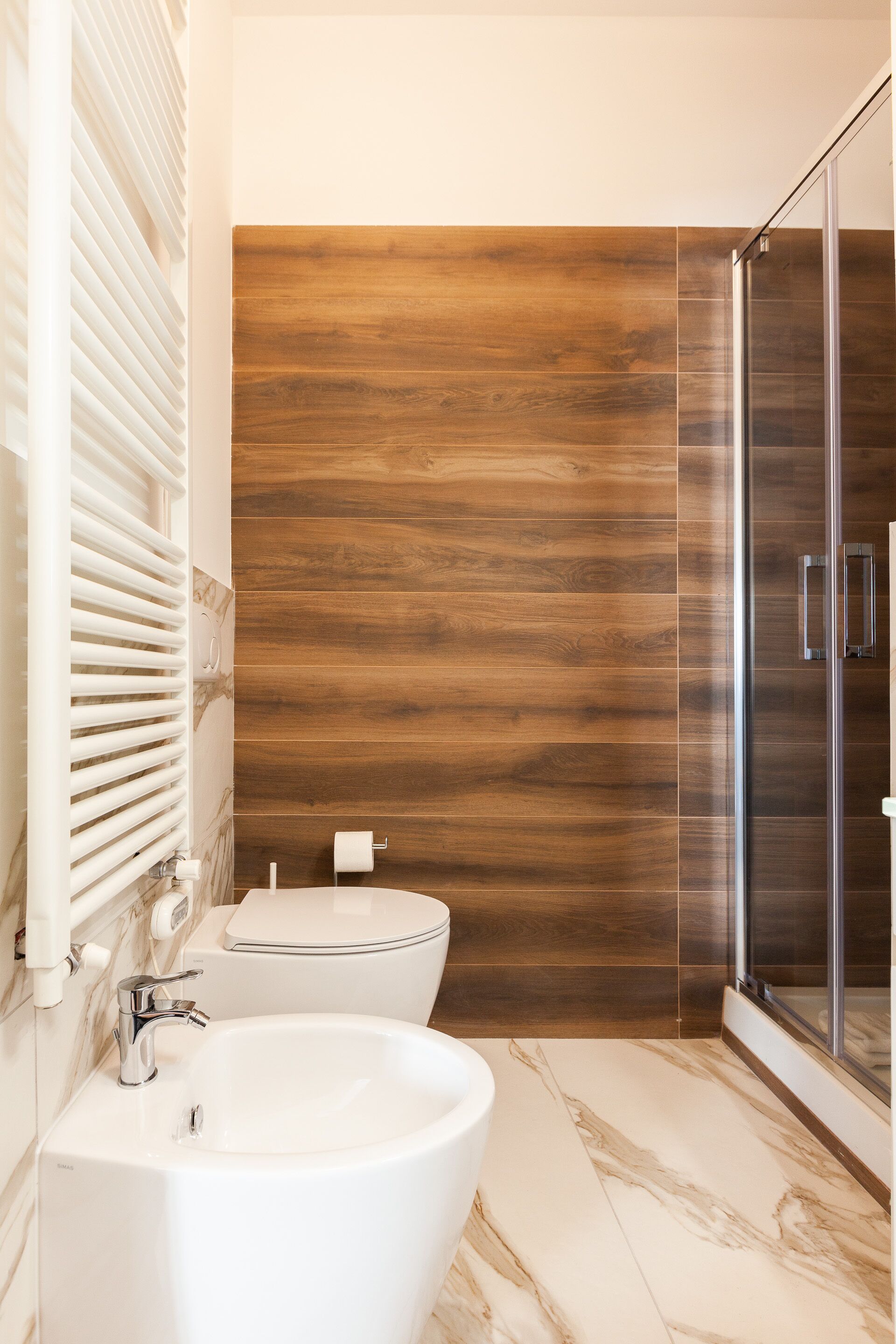 Apartamento | Banheiro | Secador de cabelo, chinelos, bidê, toalhas de banho