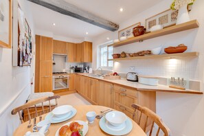 Fridge, microwave, oven, cookware/dishes/utensils