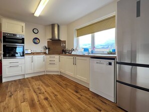Dishwasher, high chair, cookware/dishes/utensils