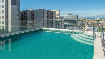 Outdoor pool, pool umbrellas, pool loungers