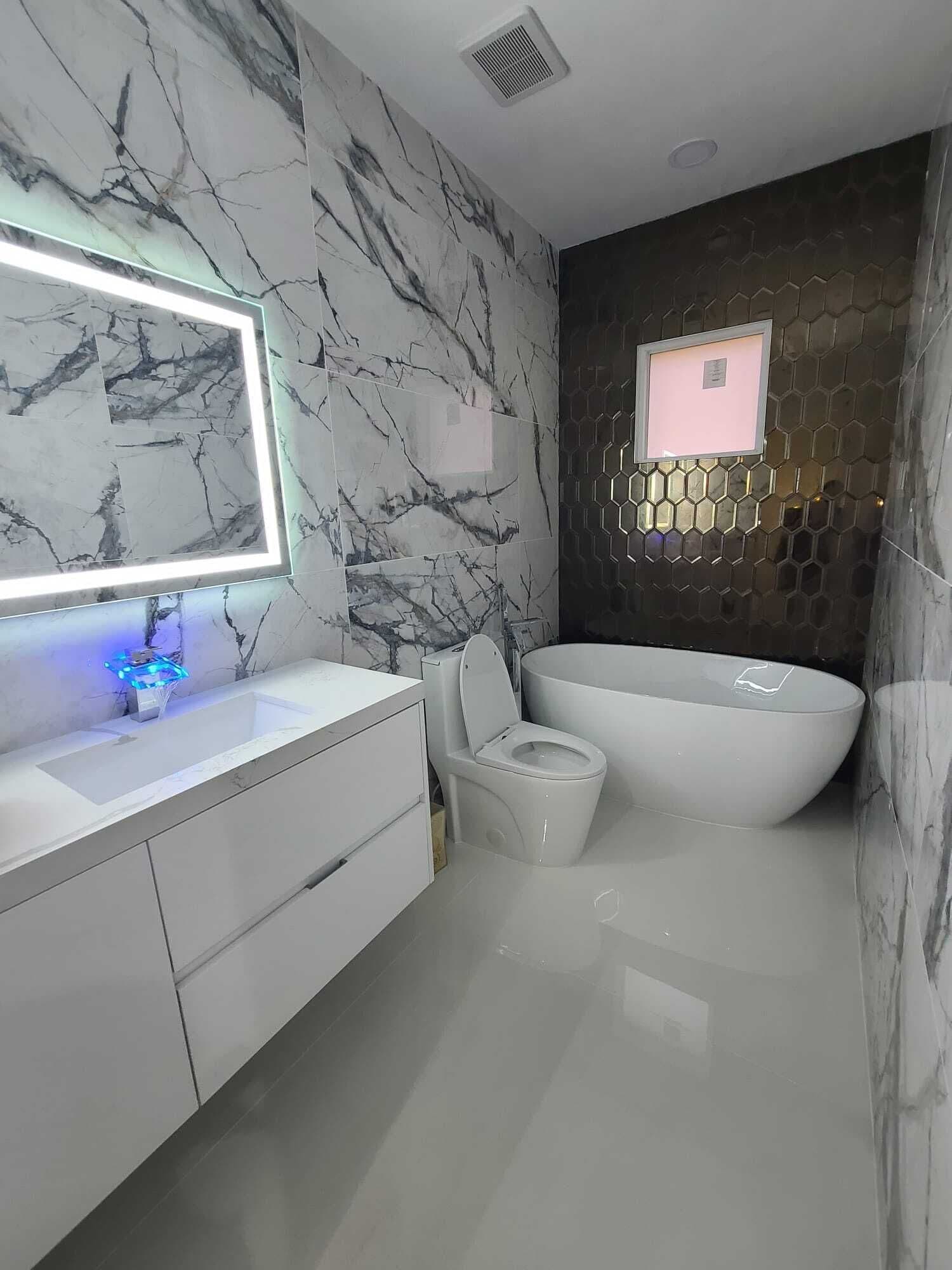 Bathtub, hair dryer, towels, soap