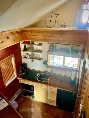 Fridge, microwave, stovetop, coffee/tea maker