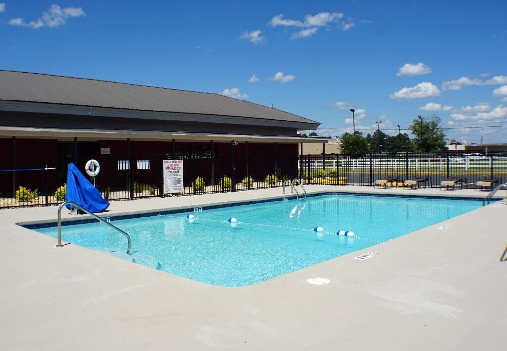 Seasonal outdoor pool, open 9:00 AM to 10:00 AM, pool umbrellas