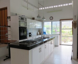 Fridge, oven, coffee/tea maker, toaster