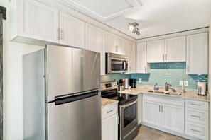 Fridge, microwave, coffee/tea maker, toaster