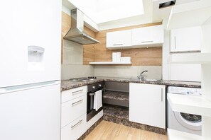 Fridge, microwave, oven, stovetop - Skyvillion Apartments - King's Cross -1Bed Modern Apartment  (Greater London)