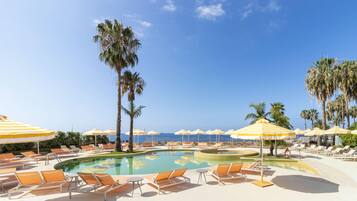 2 outdoor pools, pool umbrellas, pool loungers