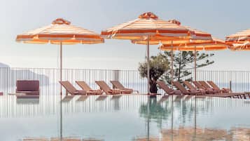 2 outdoor pools, pool umbrellas, sun loungers