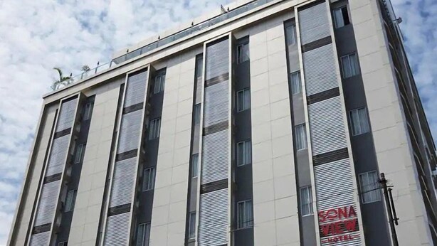 A modern hotel building with multiple floors and large windows. - Sonaview Hotel (Dumai)