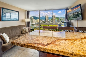 Condo, 1 Queen Bed with Sofa bed, Kitchen, Mountain View | Living room | 40-inch TV with digital channels