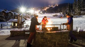 Guests can gather around the fire pit for a warm and cozy evening.