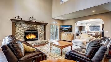 Condo, Multiple Beds, Balcony | Living room | 40-inch TV with cable channels, fireplace