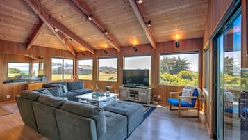House, Multiple Beds, Hot Tub, Partial Ocean View | Living room | TV, fireplace
