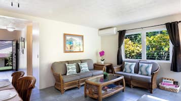 Townhome, Multiple Beds, Patio, Garden View (Surf & Racquet Club #24) | Living area | 42-inch flat-screen TV with digital channels