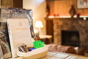 A welcome bag with a Tahoe home guide and temporary parking passes.