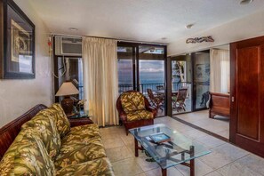 Condo, 1 King Bed, Hot Tub, Ocean View | Living room | 40-inch TV with cable channels