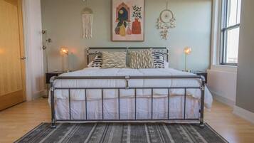 1 bedroom, desk, iron/ironing board, travel crib