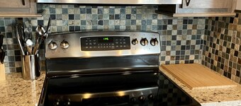  500ft across the street to Carnitha. Gromet to main lift or take Moover to Base