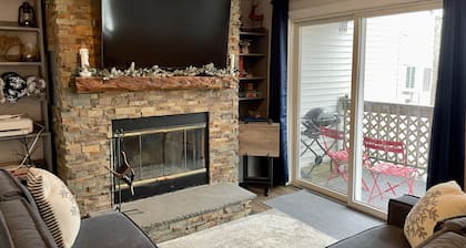 500ft across the street to Carnitha. Gromet to main lift or take Moover to Base