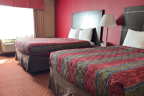 Premium bedding, down comforters, desk, laptop workspace - Broadway Inn & Suites OKC (Oklahoma City)
