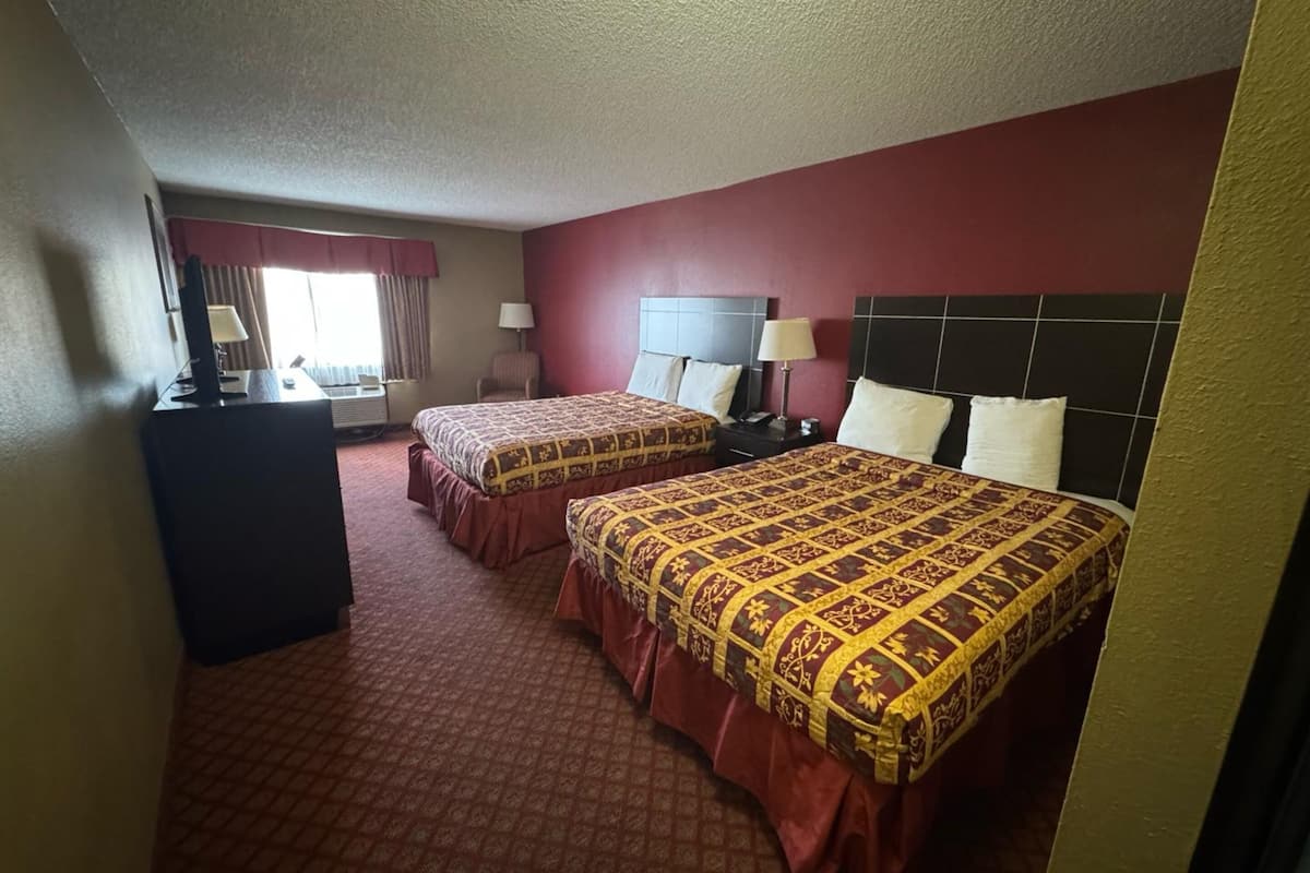 Premium bedding, down comforters, desk, laptop workspace