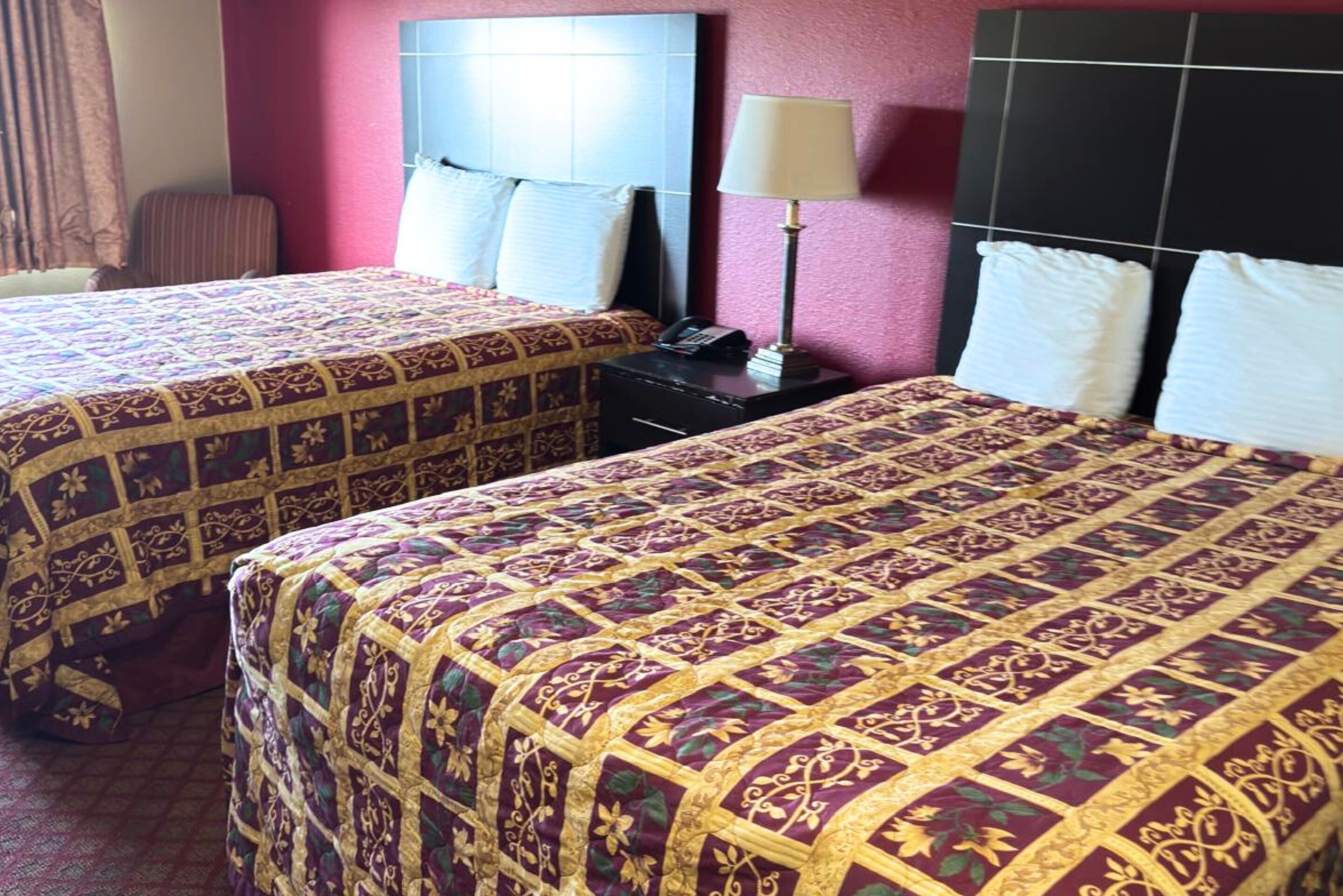 Premium bedding, down comforters, desk, laptop workspace