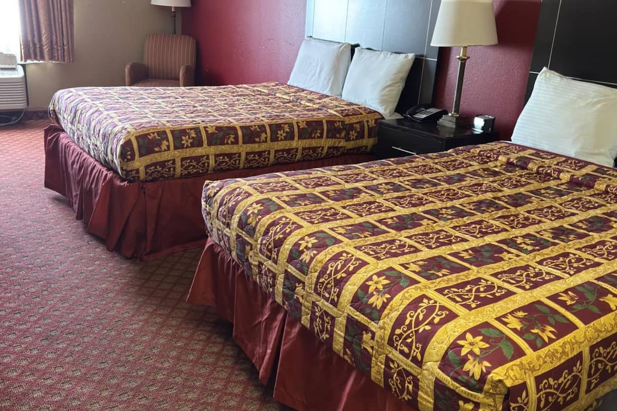 Premium bedding, down comforters, desk, laptop workspace