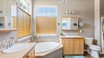Combined shower/bathtub, hair dryer, towels, soap