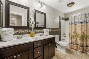 Bathtub, hair dryer, towels