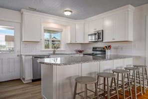 Fridge, microwave, oven, stovetop - 'Pop's Inn" - Oceanfront Home, 4 Bedrooms / 2 Bathrooms (Holden Beach)