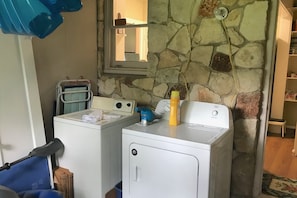 Utility/storage room with washer and dryer