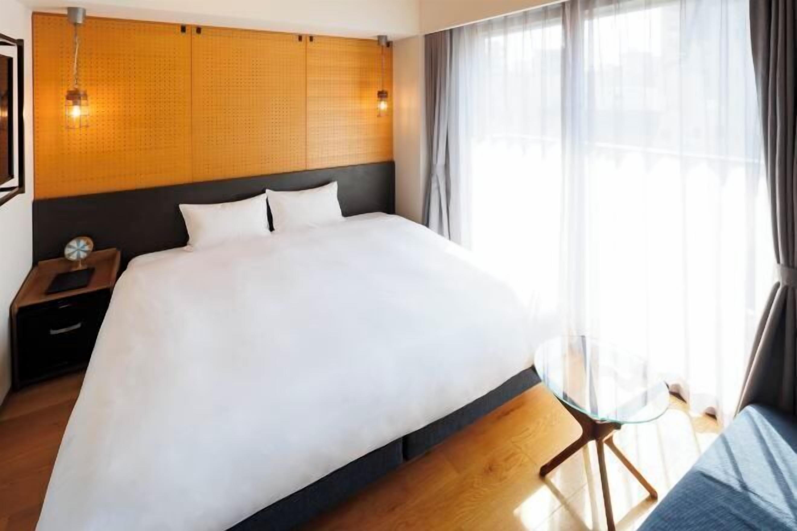 Couette en duvet d'oie, rideaux occultants, Wi-Fi gratuit, draps fournis